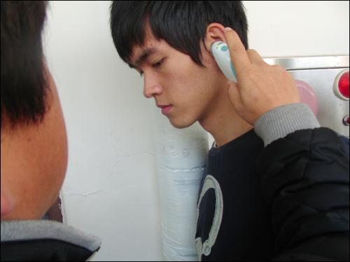 접종을 하기 전 체온측정